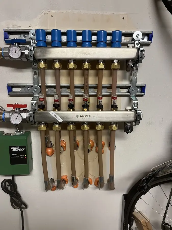 Plumber performing Water Heater Repair at a residential property in Leominster